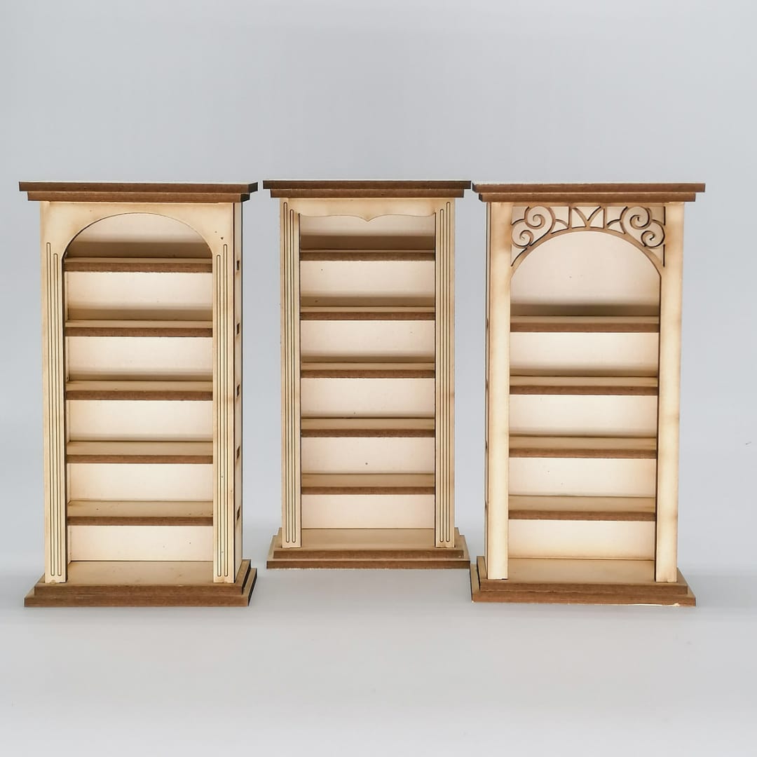 a couple of wooden chairs are in a room