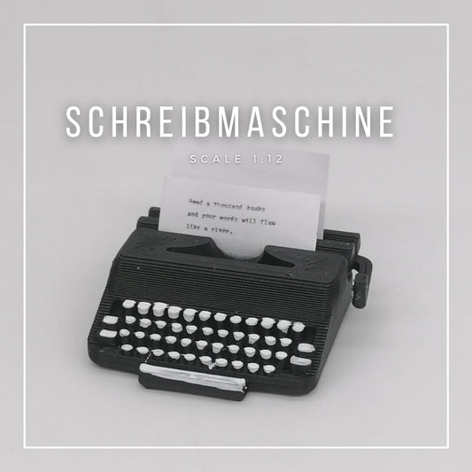 Máquina de escribir en miniatura