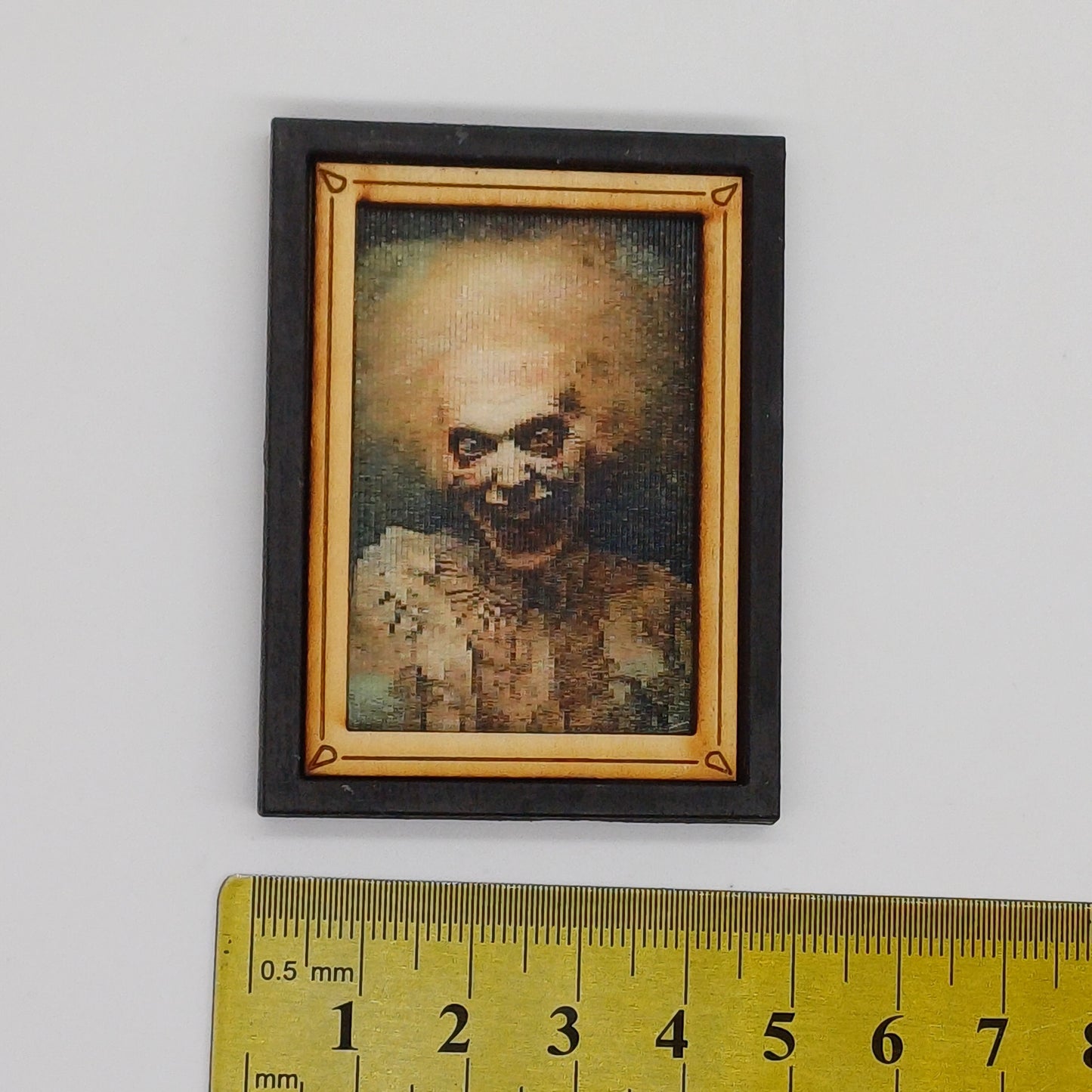 Miniature horror painting with changing image