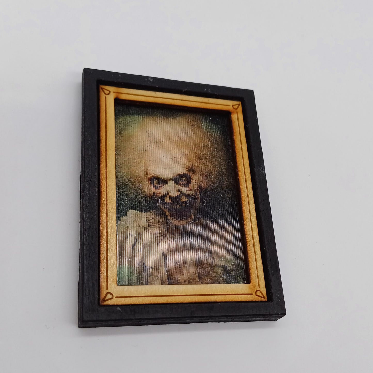 Miniature horror painting with changing image