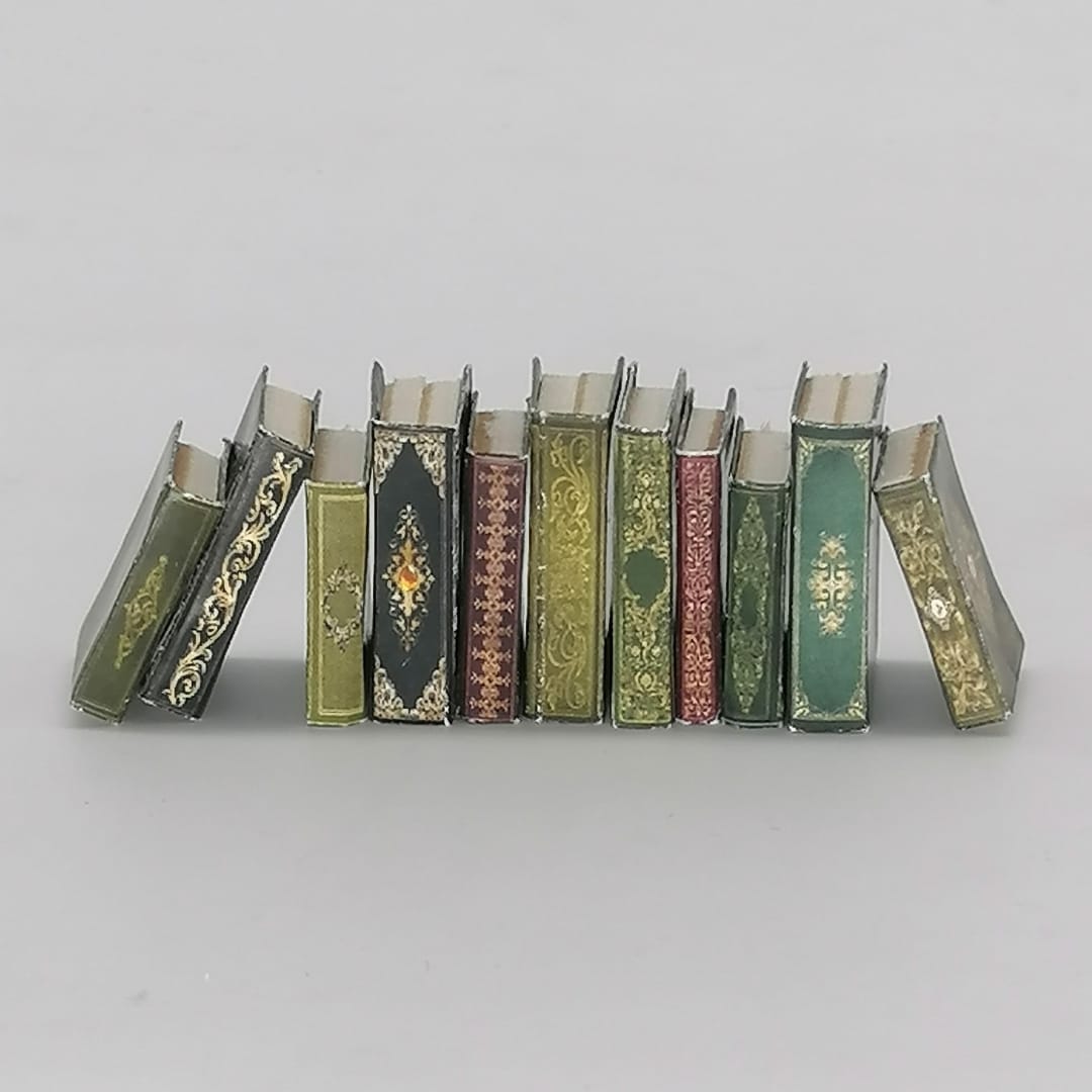 Different sized miniature books