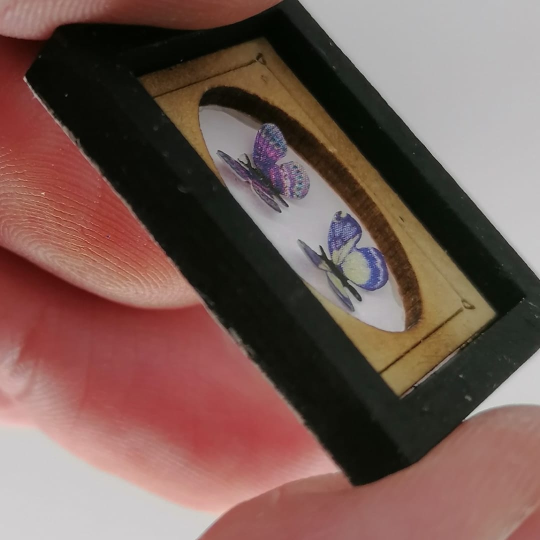 Colección de mariposas en miniatura a escala 1:12