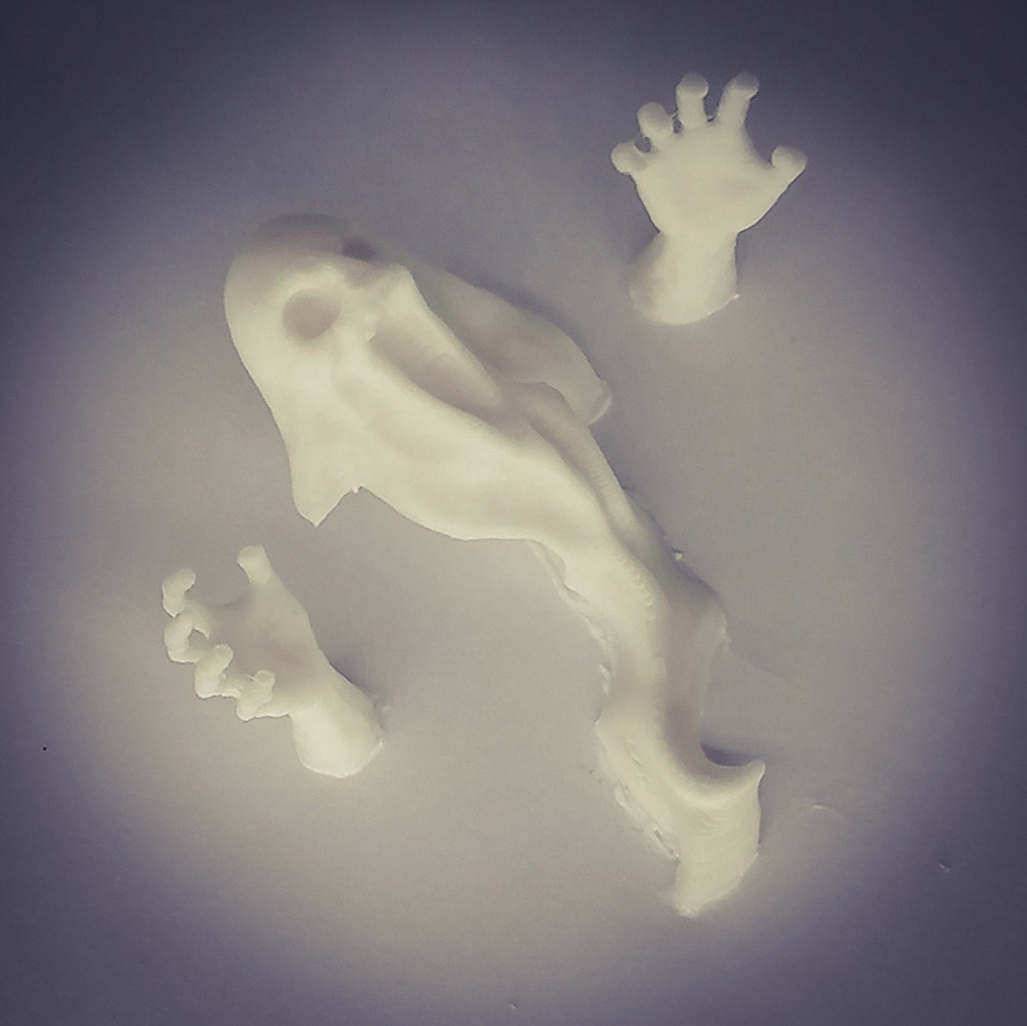 Miniature ghost and ghost hands